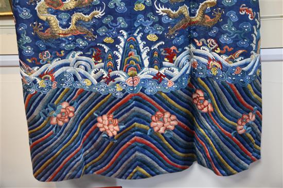 A Chinese blue satin embroidered silk and metal thread dragon robe, Jifu, late 19th / early 20th century,